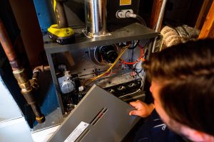 Air Alliance Team HVAC technician performing on-site service and system diagnostics